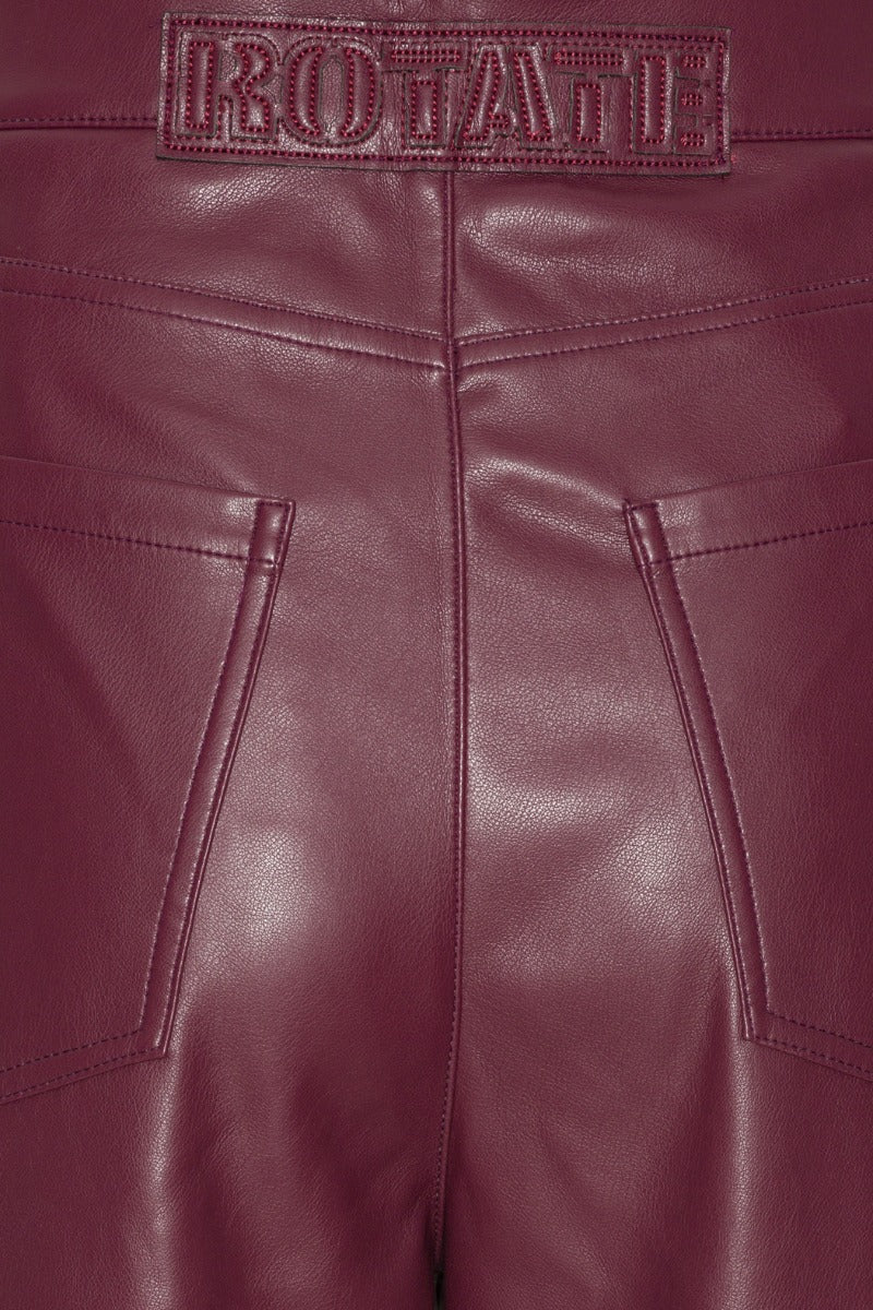 ROTATE MID WAISTED PIPING PANTS - BORDEAUX