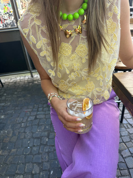 ROTATE FLOWER BEADS TOP YELLOW PRINT